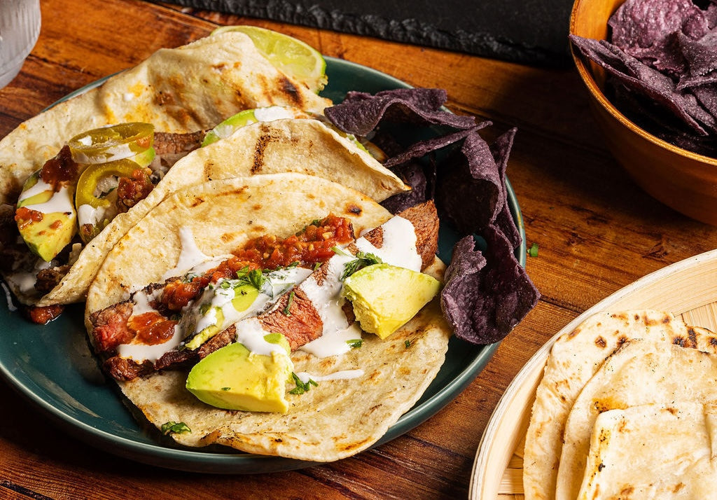 
                Chipotle-Lime Grilled Flank Steak Tacos
              